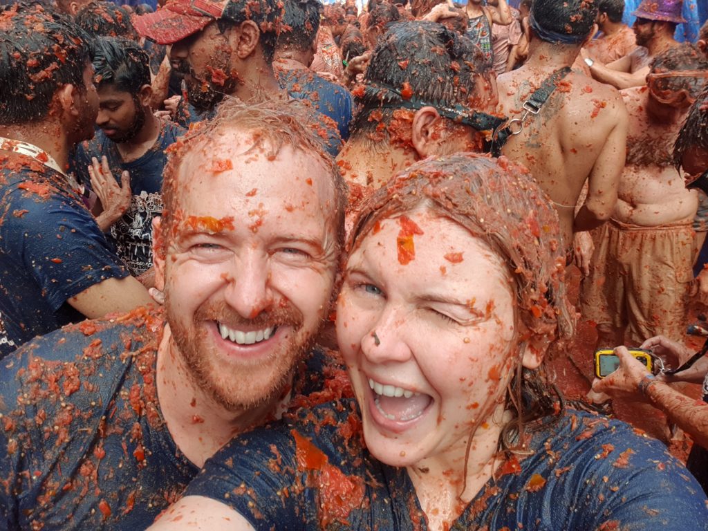Holiday Duo covered in tomatoes from the Spanish La Tomatina festival