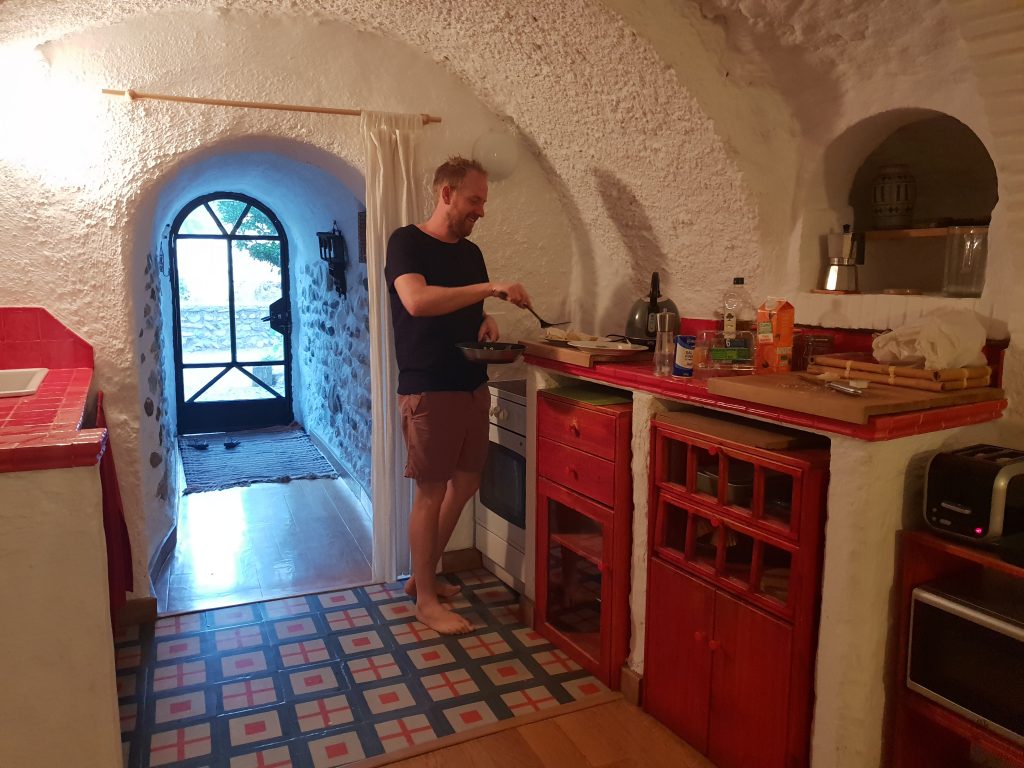 Cooking breakfast in the cave, Sacromonte, Granada